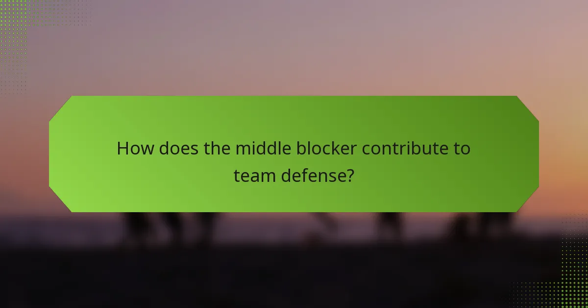 How does the middle blocker contribute to team defense?